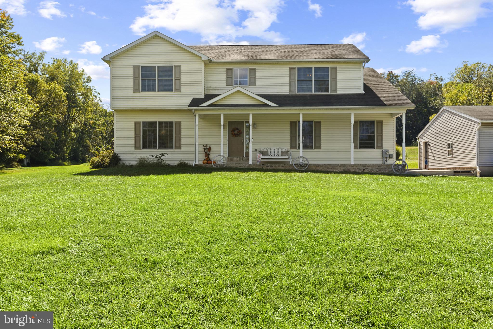 OPEN HOUSE - Sat, Sep 20 1:00 PM - 3:00 PM.
Designed with both comfort and function in mind, this home sits on almost an acre and offers generous square footage along with inviting features. The main level includes a two-story foyer, hardwood floors, and 9-ft ceilings. The custom fireplace in the living room is a beautiful feature that sets the space apart.
Upstairs, the primary suite has two walk-in closets and a large bathroom with a soaking tub and double sinks. Generous secondary bedrooms provide flexibility for family, guests, or office space.
The outdoor area includes a front porch, multiple decks, and an above-ground pool with a wrap-around deck. The oversized three-car garage, detached garage, and shed offer excellent storage options, with one garage already set up as a workshop area.
