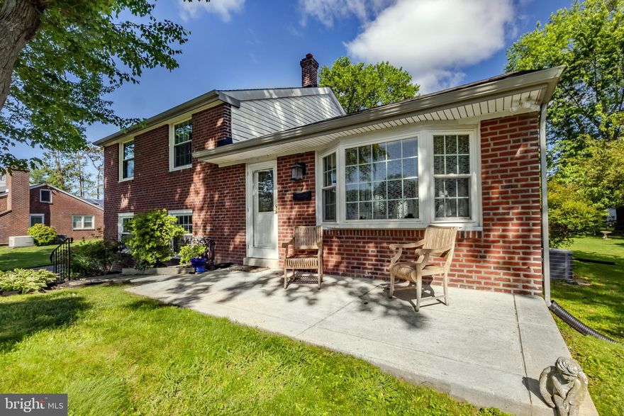 Location, charm and love!  Welcome to 105 Lombardy Dr in the heart of the coveted Sproul Estates neighborhood of Wallingford.  This 3 bedroom 1.5 bath split level home offers large living spaces, a nice level lot, front porch, back deck, a brand new HVAC system and a renovated kitchen.  Pull up and immediately admire the classic brick front curb appeal.  The first floor of the home has a large and sunlit living room with its bay window and oak hardwood floors.  The kitchen and dining room have been converted into one large space to include tons of cabinetry, a large peninsula, granite countertops, a large dining space and access to the back deck- perfect for hosting 3 seasons a year.  The 2nd floor offers 3 bedrooms and a hall bath.  The attic space has been used as a 4th bedroom in years past and can also offer phenomenal storage space!  The lower level has great rec room space, a half bath and a separate laundry room as well as utilities.  The backyard is level, the driveway is large and this property is ready for its new owner.  Sproul Estates is known for its tree lined streets, offering easy access to schools and parks yet is perfectly tucked away.  Take advantage of the award winning school district and this very loved and ready to go home!
