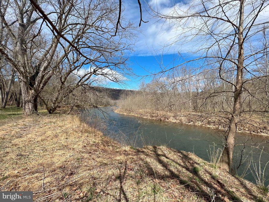 Are you looking for a river lot that you can build your dream getaway on or a place to camp during the summer?  Look no further.   River lots are in high demand and this one won't last long.  This 2.4 +/- acre lot can bring you , your family and friends enjoyment for years to come.  This lot has it all from trees, to flat building areas to river frontage.  Plenty of relaxation to be had with the seclusion this lot offers.  Less than an hour from historic Cumberland, MD and around 2 1/2 hours away from Washington, DC, this is your perfect getaway spot to enjoy camping, fishing and river fun all year long.