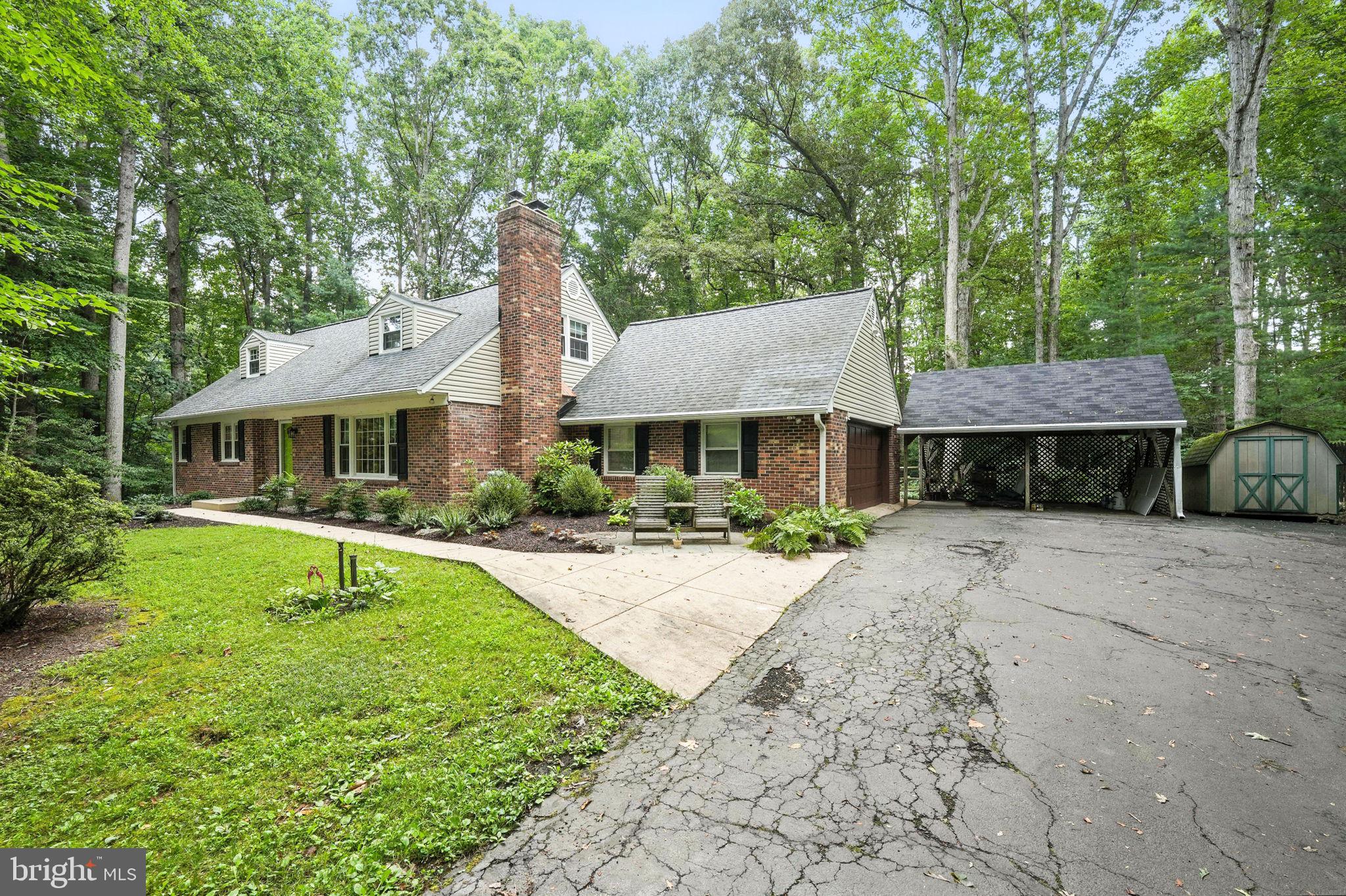 Welcome to 13375 Marie Drive, a beautifully updated 4-bedroom, 3.5-bathroom home nestled on a private, wooded lot in one of Manassas' most desirable neighborhoods—with NO HOA and zoned for sought-after schools including Colgan High School. Step inside to discover fresh new flooring throughout most of the main level and a bright, open kitchen that flows effortlessly into a warm and inviting sunroom. Here, you'll enjoy stunning views of the backyard—a peaceful haven full of trees, birds, and wildlife. Whether you're sipping coffee in the morning or winding down in the evening, this serene space offers true relaxation. The main level features three spacious bedrooms, including a primary suite with an attached full bath. Upstairs, you'll find a second, larger primary suite complete with a beautifully updated and upgraded en-suite bathroom and access to a charming balcony—perfect for enjoying quiet moments outdoors. The mostly finished basement includes a walk-up entrance from the backyard, a bonus room currently used as a music room, a cozy pellet stove, bar area, laundry room, utility room, and ample storage—ideal for entertaining or simply spreading out.
Recent upgrades add peace of mind and value:
✅ New septic system (2024)
✅ New flooring (2025)
✅ Siding replaced (2021)
✅ HVAC and boiler replaced approx. 7 years ago
Outside, enjoy the convenience of an attached 2-car garage, paved driveway, carport, and separate shed—plenty of space for hobbies, tools, and parking. With tree-lined streets, private acreage, and a welcoming community feel, this property offers the perfect blend of comfort, space, and natural beauty. Come experience everything this wonderful home has to offer—schedule your tour today!