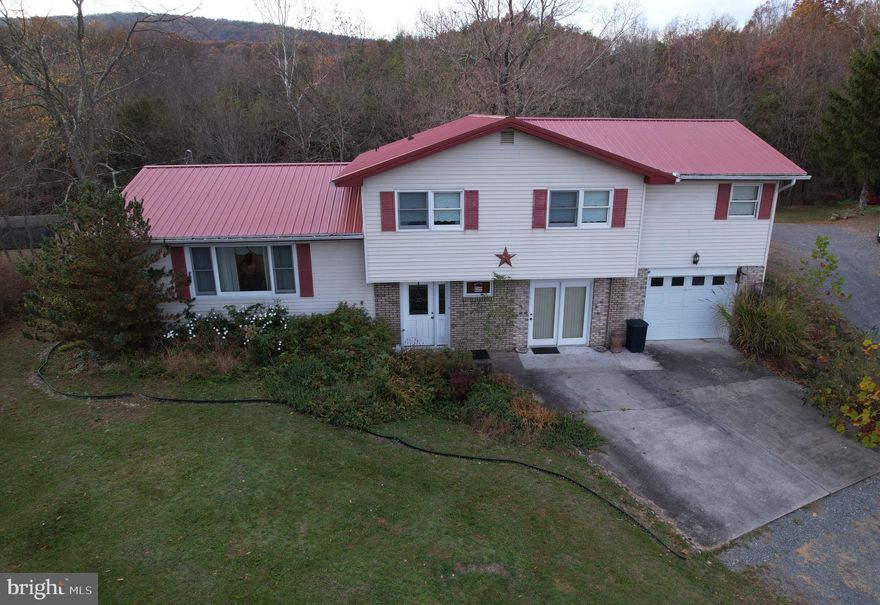 If you are looking for a beautiful home located in the stunning mountains of Almost Heaven West Virginia don't look any further! Let us show you this spacious home located outside the town of Petersburg, West Virginia. You can have the joy of country living but be close to all the amenities that the wonderful town of Petersburg has to offer. This property is located close to so many wonderful natural areas like Seneca Rocks, Dolly Sods, Spruce Knob and so many more.  Call us today for a showing and you will not be disappointed!