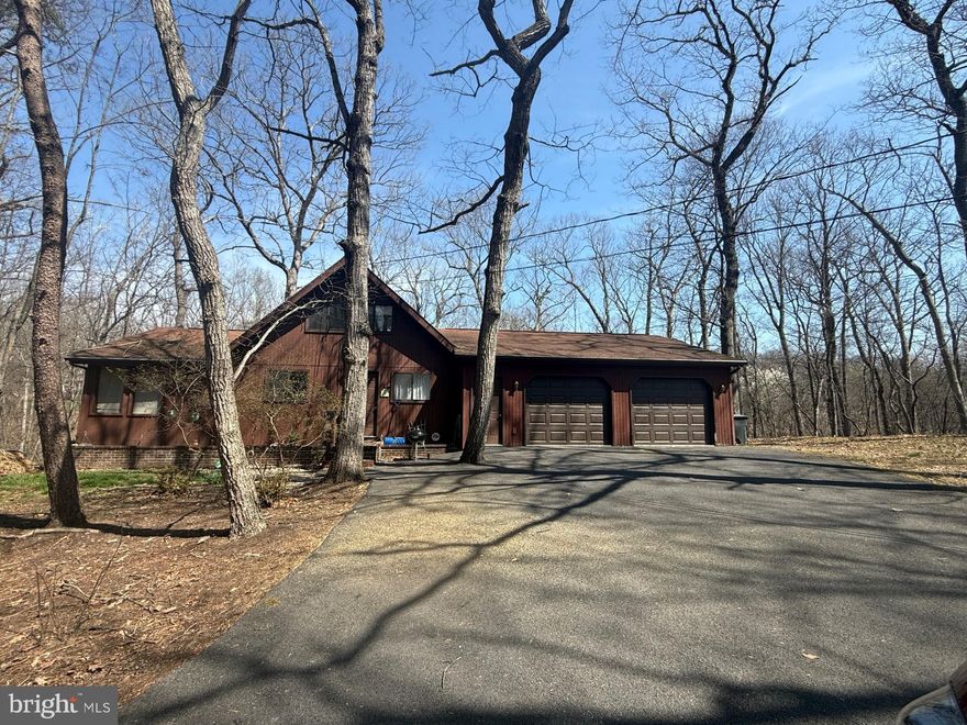 Welcome to this charming chalet-style single-family home nestled in the desirable Walden Woods community! Featuring soaring cathedral ceilings and a stunning wall of windows, the living room is filled with natural light and offers a warm, inviting space to relax or entertain.

The dining area, conveniently located just off the kitchen, provides easy access to the back deck—perfect for everyday living and hosting gatherings. The main-level primary suite offers comfort and convenience, complete with a private sliding glass door leading to a 12x12 screened-in porch. Step outside to the open deck with stairs that lead down to the swimming pool, creating the ultimate setup for entertaining family and friends.

The en suite primary bathroom features a luxurious whirlpool tub and a separate glass-enclosed shower, offering a spa-like retreat at home. Additional highlights include a paved driveway leading to an attached two-car garage, complete with a half bath and attic storage for added convenience.

Enjoy peace of mind with a roof that is only approximately 6 years old. Outside, you’ll also find a storage shed, perfect for keeping all your lawn and garden tools organized. This home combines comfort, functionality, and great outdoor living—don’t miss your opportunity to make it yours!