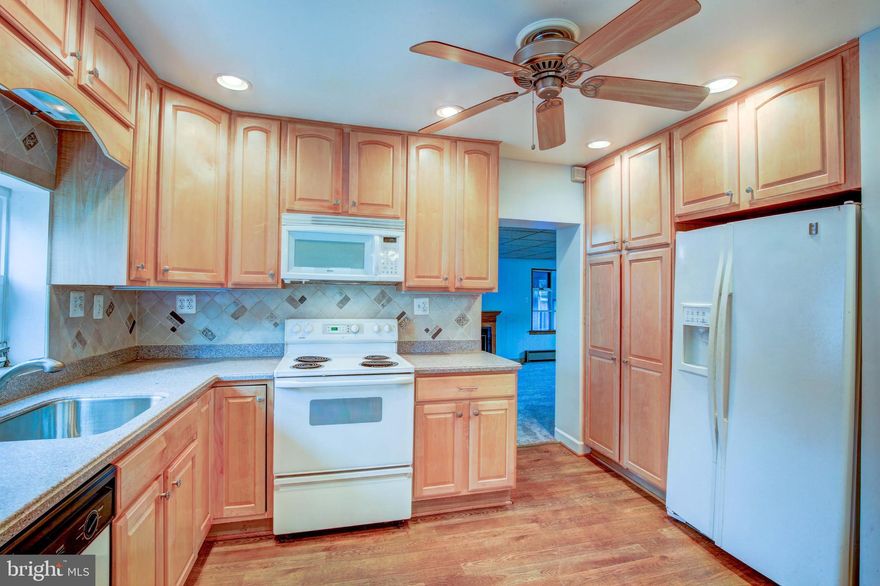 REDUCED 10K  Over 1800 Sq Ft of living space 4 bed 2.5 bath... This open concept, three bedroom, two and a half bath cape cod is not to be missed! The upper level master with bathroom and sitting room is just the beginning. The kitchen boasts corian countertops, tile backsplash, and 48" cabinets. Two bedrooms and two full bathrooms on the main level with SO MUCH SPACE. New carpet! There are two large additions, one with bay window and fireplace as well as the second full bathroom. The second addition is a spacious 4 seasons room with hot tub and sliding glass door. There is also an unfinished full basement with walkout.  Call #1ASG for a showing today.