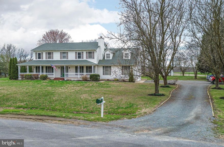 Queenstown - This 4 bedrooms, 2.5 bath home is located between Route 50 and Route 301, so great access to either.  Nice country setting with no HOA.  Bright and open kitchen/family room with also formal living room and dining room.  Spacious bedrooms and a bonus room over the garage.  You will enjoy the wrap around porch and country living, but still close to everything.