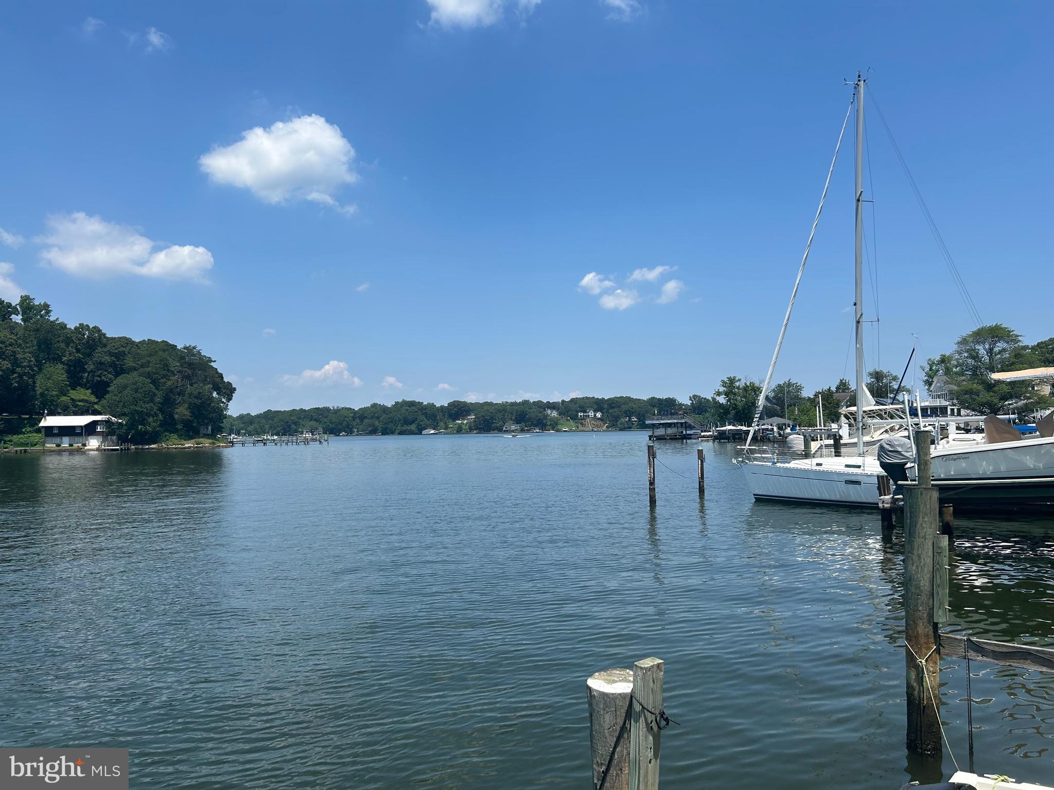 Welcome to your charming waterfront escape on Valentine Creek! Nestled among mature shade trees at the tranquil end of Willow Trail, this 2-bedroom retreat offers a rare opportunity just off the Severn River. Enjoy unparalleled relaxation from your private pier or the expansive deck, perfect for watching the serene water life unfold. Whether you choose to renovate or a brand-new custom build, the possibilities are endless. Discover the vibrant lifestyle of Herald Harbor, complete with a neighborhood restaurant and amenities galore! With quick access to I-97 and Route 50, you're perfectly positioned for both peaceful waterfront living and easy commutes. This unique property is ready for your vision – come make it your own!"