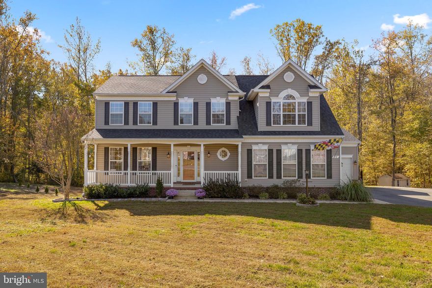 You will love this spacious colonial situated on over 1.5 acres! This home includes an oversized 3 car garage, 9 ft ceilings, hardwood floors, open concept kitchen that flows to great room and deck access with a pool all surrounded by the privacy of wooded acreage. The enormous primary suite features vaulted ceilings, sitting area, large walk in closet and super bathroom. While upstairs, you will find 3 additional bedrooms, an additional full bathroom, plus the washer and dryer for super convenient laundry days!  The walk-out basement was built with 9’ ceilings to accommodate any of your future plans. All with a convenient commute to DC, Annapolis, Baltimore, Southern MD, Andrews AFB, and NSA/Ft. Meade areas.