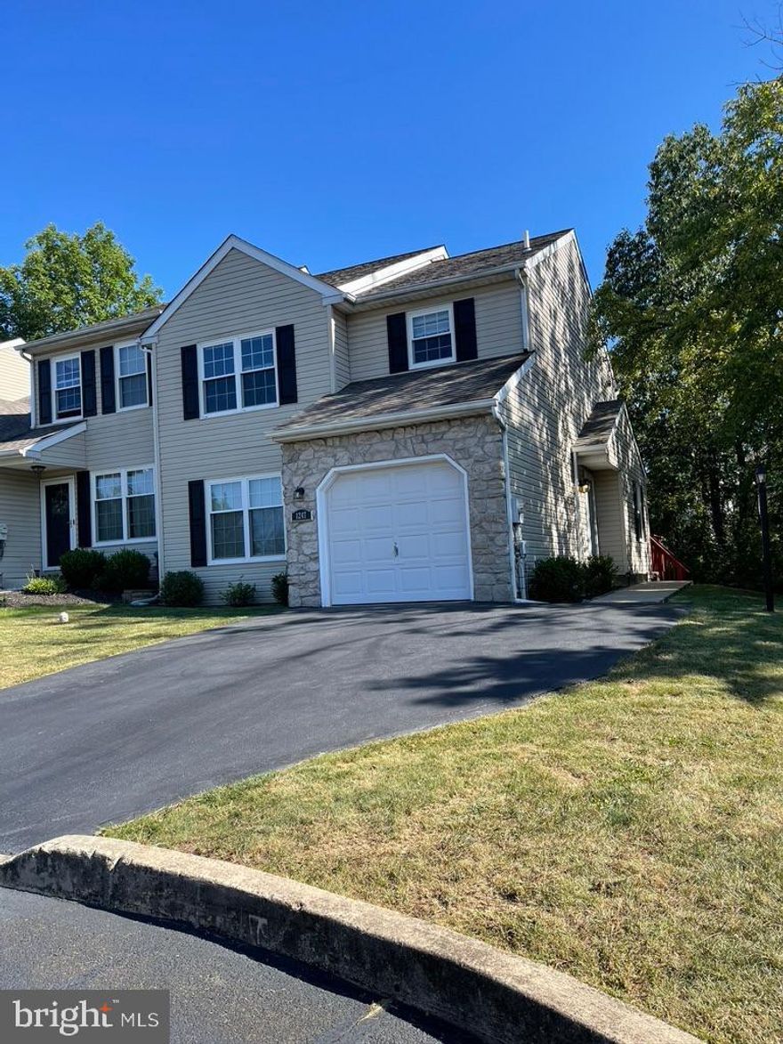 Welcome to this well maintained townhouse in Stonegate.  Located in the North Penn School District and just a few miles from Merck, the home is an end unit with a private side entrance and abuts wooded open space.  It has great living space and storage and is a roomy  3 bedroom, 2.5 bath home. As you enter the hardwood floored hallway you will immediately notice the natural light and convenient layout on the 1st floor: a large living room, a dining room and an open kitchen which expands to a bonus room and a large outside deck. Head upstairs to the large owner's bedroom with vaulted ceiling and ceiling fan.  This bedroom includes a big walk-in closet and a full bath with a stall shower, as well as a soaking tub for relaxing in after a stressful day. Completing the upstairs are 2 additional bedrooms, a main hall full bath with a tub/shower and the laundry area. The full basement is unfinished and is  perfect for an additional play area, storage or for working on projects. Included is an attached 1 car garage and a bonus of 2 outside parking spaces in the driveway, as well as additional parking areas for owners and guests. All the lighting has been switched to energy efficient LED lighting. The HOA includes: Common Area Maintenance, Trash, a Tot Lot/Playground, Basketball, Pickle Ball and Tennis courts. Located in Upper Gwynedd Township this townhouse is in a very convenient location: close to major highways, mall shopping and local restaurants. The owner is a licensed Pennsylvania real estate agent.