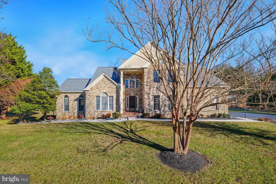 Welcome to 14205 Cervantes Avenue, a  luxury single-family home nestled in the desirable Darnestown Knolls subdivision boasting 4 bedrooms, 4.5 baths and three finished levels. This nearly 5,800 square foot residence is beautifully situated on a sprawling, private 2.08-acre lot that backs to the serene, wooded expanse of Muddy Branch Park, providing a tranquil backdrop for your everyday living. 

This home with an elegant brick front features two expansive decks, a huge patio, and an outbuilding equipped with electric service, perfect for a workshop or additional storage. A charming gazebo accents the outdoor space, making it an ideal setting for entertaining or relaxing in nature. The property is enhanced by a newly repaved expanded driveway and a roof installed in 2022, complete with 50-year shingles for added peace of mind.

Step inside to discover a gracious entrance foyer with soaring 20-foot ceilings, setting the tone for the luxurious finishes throughout. The gourmet kitchen is a chef's dream, featuring high-end appliances and ample space for culinary creations. Entertain guests in the formal living room and dining room, or unwind in the sunroom, highlighted by vaulted ceilings and an abundance of natural light.

The main level also includes a private office, perfect for remote work or study. Upstairs, the primary bedroom offers a retreat-like experience with two generous walk-in closets and a spa-like bath featuring a separate shower and soaking tub. Three additional spacious bedrooms are located on this level, one of which includes a private en-suite bath.

The fully finished walkout lower level is a standout feature, offering an expansive recreation room, a versatile flex room or den, a full bath, and a huge finished storage area that can easily be converted into additional living space. Cozy up in the dedicated home theater, perfect for movie nights or entertaining friends.

It is located just seconds from Haris Teeter, River Road, Darnestown Road, and just minutes from the South Germantown Recreation Center.

Don’t miss the opportunity to make this luxurious property your forever home!