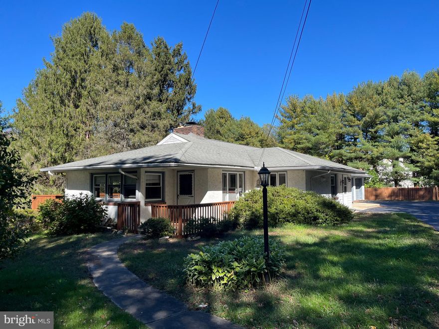 Welcome to this country ranch on over an acre of property in a peaceful wooded setting! Enjoy a newly updated kitchen including granite countertops and brand new refrigerator open to your dining area/breakfast nook. Transition to a large, inviting living room with a cozy fireplace and spacious deck right outside. This home features 3 bedrooms including a primary bedroom with a private balcony and a full bathroom on the main floor as well as an additional bathroom in the mostly finished basement with kitchenette.  A two car attached garage and recently paved driveway offer ample parking or storage. Pool not included in rental. Tenant responsible for utilities- electricity and oil. No cats please.