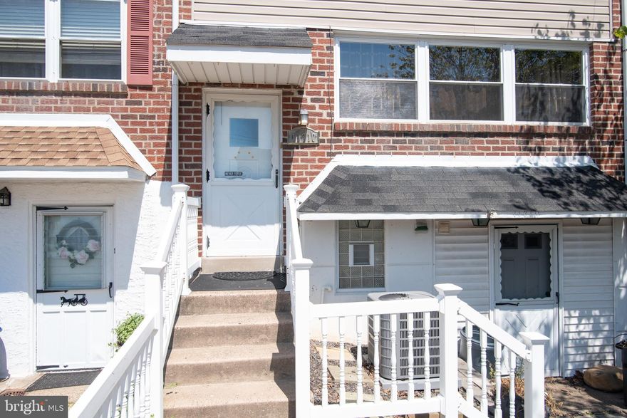 Welcome to 11710 Corry Rd., a solid interior row home located in the Walton Park neighborhood in the Great Northeast! This 1,470sf home has 3 bedrooms, 1.5 baths and awaits your vision and creativity. It's one of the few homes with driveway parking out front. The large living room features a wall of windows for plenty of natural light. The dining room has ceiling fan, coat closet and entrance to basement, with open pantry area. The eat-in-kitchen features an extra-large enclosed pantry, plenty of cabinets, and a ceiling fan. The 2nd floor features a large primary bedroom with two double closets and a ceiling fan. The full hall bath and two additional bedrooms with ceiling fans and ample closet space complete the 2nd floor. The finished basement includes a family room with access to the rear covered patio, a separate laundry room and half bath.  The garage has been converted into a work room/storage space with a separate exterior entrance door.  This ideal location is close to shopping, restaurants and major roadways.  This home will not last long! Book your showing today! 
This home is being sold As-Is and the seller will not be making any repairs or providing credits.