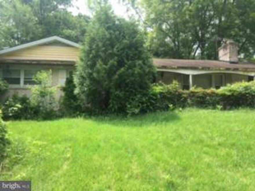 Spacious brick rambler with 4 bedrooms, 3 full baths, eat-in kitchen, separate dining room, large living room, hardwood floors, spacious rec room and 1 car covered carport parking on a cul-de-sac location, sold "as is."  Property has sever foundation cracks and will not qualify for financing.  Proof of CASH funds required with all offers.