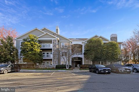 Photo of 1720 Lake Shore Crest Drive #26, RESTON, VA 20190 (MLS # VAFX2296822)