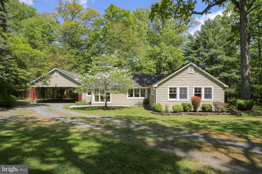 Do you want to feel like you’re on vacation every day—and enjoy effortless one-level living? This may be the one.

This classic rambler in Washington Grove has been thoughtfully renovated and expanded to blend charm with modern comfort. Set on a 22,295 sq ft lot, with an additional 13,648 sq ft front parcel included—both parcels convey with the sale—the property offers a rare combination of space, flexibility, and long-term value. The current owners added a stunning, light-filled kitchen and an expansive family room featuring the signature Washington Grove vaulted beadboard ceiling—creating a warm, inviting space with room for lounging, casual dining, and even a work-from-home setup.

The addition introduces both a sun-drenched dining room with floor-to-ceiling windows—seamlessly bringing the outdoors in—and a beautifully updated primary suite featuring a spa-inspired en-suite bath with dual vanities and a walk-in closet. Main-level laundry adds everyday ease, while two additional bedrooms and a flexible bonus space—ideal as an office or den—offer versatility for today’s lifestyle.

The full lower level provides abundant storage and space for hobbies, fitness, or future expansion. Step outside to a private deck off the family room—ideal for entertaining or simply enjoying the peaceful surroundings.

Nature truly surrounds you here, with the home adjacent to protected woods owned by the Town of Washington Grove.

With nearly 100 acres of parkland and a private swimming lake, Washington Grove offers a rare, close-knit community atmosphere. Enjoy beloved traditions like Music Weekend, the 4th of July Parade, Summer in the Parks, and Labor Day festivities—all part of the town’s unique charm.

Ideally located within walking distance to the MARC train, with easy access to Shady Grove Metro Station, I-270, I-370, and the ICC—this is where tranquility meets convenience.