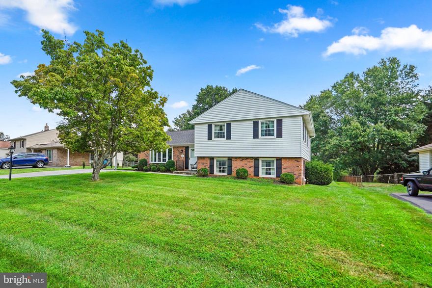 Welcome to this beautiful and wonderfully maintained split level located in the heart of Olney Mill! Gleaming hardwoods surround you on the main level which includes a formal living room, dining room, and eat-in kitchen, with plenty of storage and prep space! There is an abundance of natural light in every room! Upstairs you will find 3 ample-sized bedrooms and 2 full bathrooms which include the generously sized primary room and en-suite. In the lower level, you will find a wonderful family room with a wood-burning fireplace and backyard access, as well as an additional 4th bedroom and half bathroom. The basement is a blank canvas; perfect for either storage or the basement of your dreams!! The backyard has plenty of space to offer and is perfect for a fire pit for those cool fall evenings. Walking distance to neighborhood schools, tot lots, walking paths, and everything else Olney Mill has to offer! Don't miss this one!