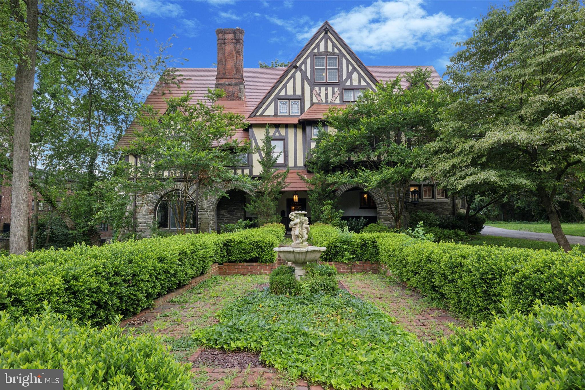 Once in a lifetime opportunity to purchase "Kelty", a majestic Tudor Mansion built by renowned architect William Lightfoot Price. Tucked away down quiet Berwick Rd is this special property that is filled with architectural treasures galore. Incredible details that remain intact including hand carved fireplace mantles, leaded glass windows, stone and plaster archways and unparalleled millwork including wainscoting, moulding, exposed beams, seating and staircases that all have stood the test of time. This is a historical and architectural delight both inside and out but also boasts extraordinary living space (over 8000 sq ft) and a flat, level lot that sits just under an acre of land in beautiful Merion Station. The top floor of this home is incredibly unique with soaring ceilings, a mighty stone fireplace and a long history of musical/play performances with a stage and seating design. This space could function as a magnificent primary suite with the gorgeous luxury bath attached, a full built-in bar and a charming walk out Juliet balcony. A detached carriage home sits outside at the end of the driveway with 2 stories of living space and storage/parking. This home has incredible detail inside and out and is ready for its next steward. Located in award winning Lower Merion School District and easy access to Center City, Philadelphia and both the Merion and Overbrook train stations. Make your appointment to see this special property today.