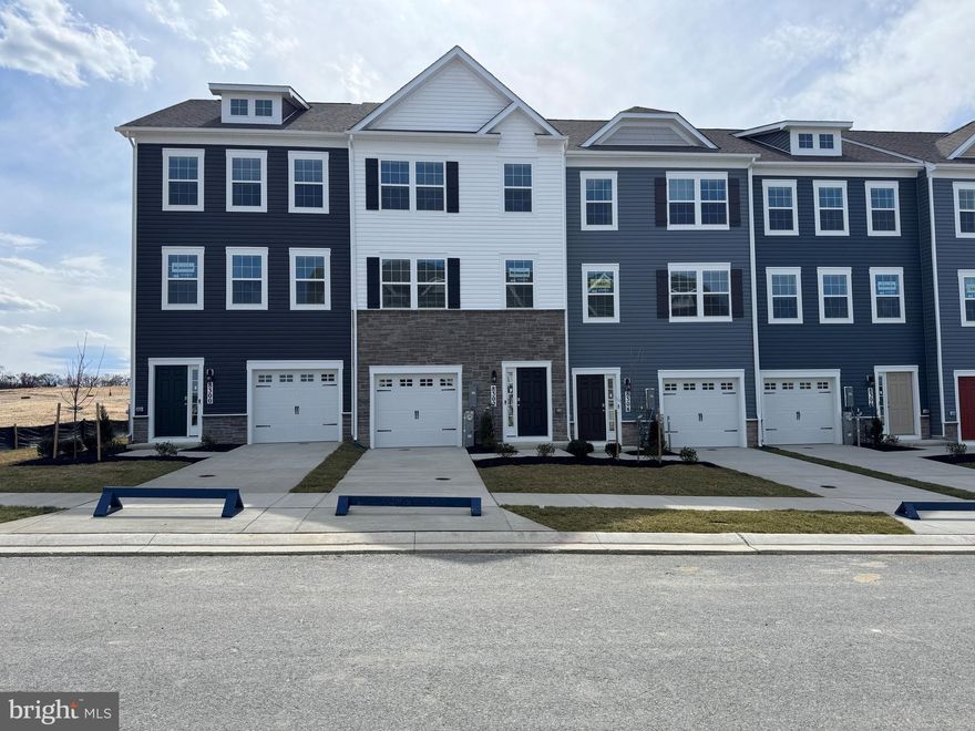 NEW END UNIT JUST RELEASED FOR SALE! HGTV worthy home with wooded views! If you are dreaming of your perfect home, look no further than this home! The inside is breathtaking and a showstopper than leaves nothing to be desired. The main level is complete will wall to wall luxury plank floors; an entertainer’s dream kitchen accentuated with stainless steel appliances, granite countertops, and overhang for bar stools. The owner’s suite oozes luxury with space for a king size bed that leads to a large walk-in closet. The on-suite bathroom has dual vanities and oversized walk- in shower. Two additional bedrooms and 2nd floor laundry and full bath completes the 2nd floor. Complete with a private deck, off the kitchen it is the perfect place for summer evenings with friends and family. This home cannot be overlooked! Contact us today to schedule a showing and to ask about our amazing incentives!