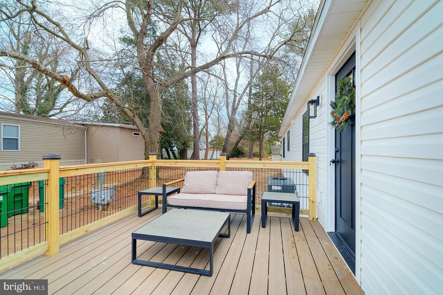 Welcome to this beautifully renovated 2-bedroom, 2-bath manufactured home located in the desirable McNichol Place community in Lewes, Delaware. This move-in-ready residence has been completely remodeled from top to bottom, offering modern comfort, style, and peace of mind. Enjoy a brand-new HVAC system, windows, roof, and fully updated electrical service and panel, along with all-new plumbing and drywall throughout. The interior features stylish LVP flooring, new cabinets, granite countertops, and a contemporary tile backsplash, complemented by all-new appliances and custom closets. Energy efficiency was thoughtfully upgraded with enhanced insulation, including R-30 ceiling insulation, R-21 floor insulation, and R-15 wall insulation, ensuring year-round comfort. Ideally located minutes from downtown Lewes and the beach, this home offers convenient access to the Rehoboth Beach outlets, top-rated dining, and vibrant entertainment. Outdoor enthusiasts will love the proximity to miles of Atlantic Ocean shoreline, boating, and scenic hiking trails. This exceptional home combines modern upgrades with an unbeatable coastal location—perfect as a primary residence, vacation getaway, or investment opportunity.