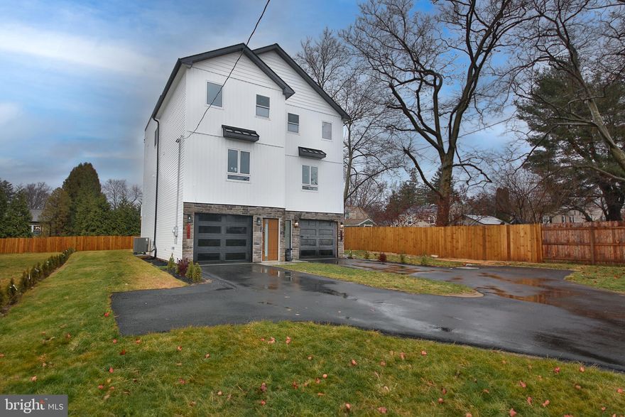 Welcome to your dream home in the heart of Glenside! This stunning new construction offers modern elegance and thoughtful design. As you enter the lower level, you'll immediately notice neutral-toned walls, and recessed lighting that create a warm and inviting ambiance. This level features a versatile office space​/ bonus room with full bathroom, ​and access to the backyard, perfect for working from home or hosting guests.  The main level features hardwood floors and has an open-concept layout, seamlessly connecting the family room, dining area, and a sleek, modern kitchen, along with a powder room. The kitchen shines with white cabinetry, stainless steel appliances, and a chic tile backsplash, Sliding doors lead from the dining area to a spacious deck, ideal for outdoor entertaining.  On the upper level, you'll find a luxurious primary suite complete with a walk-in closet and an en suite bathroom featuring a rainfall shower, gold accents, and wood paneling for a spa-like retreat. Two additional bedrooms share a hall bathroom, offering ample space for family or guests.  This home also includes a garage and driveway Situated close to downtown Glenside and Jenkintown, you'll have easy access to vibrant shopping, dining, and entertainment options, including the Keswick Theater. Commuters will appreciate the proximity to the PA Turnpike and train stations with service to Philadelphia.

Don’t miss this incredible opportunity to own a brand-new home in an unbeatable location. Schedule your showing today!