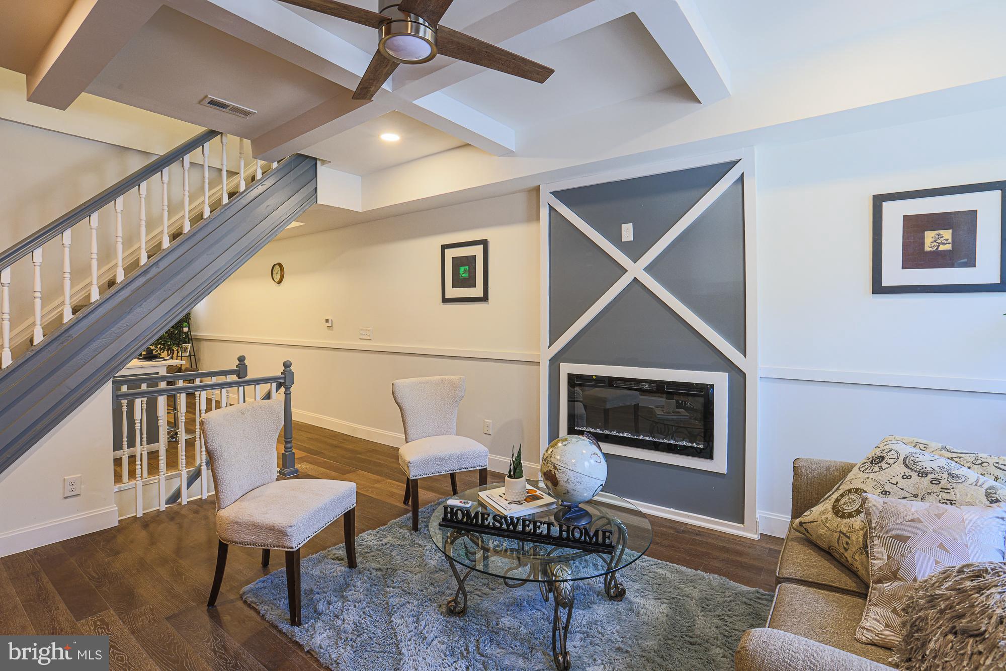 Fully Renovated & Move-In Ready! Welcome to 1909 Mosher St – a beautifully remodeled 3-bedroom, 2.5-bath rowhome offering modern living in the heart of Baltimore. From top to bottom, this home has been thoughtfully updated with stylish finishes and quality craftsmanship. Step into an open-concept main level featuring a blend of hardwood and luxury vinyl plank flooring, a sleek kitchen with stainless steel appliances, quartz countertops, and custom cabinetry with a half bathroom on the main level. Upstairs, you’ll find three spacious bedrooms and one fully updated bathroom with modern fixtures and tilework. The finished basement includes a full bath and a flexible space perfect for a home office, rec room, or guest area. Ideal for homeowners or investors, this property is just minutes from major commuter routes, downtown Baltimore, and local parks.