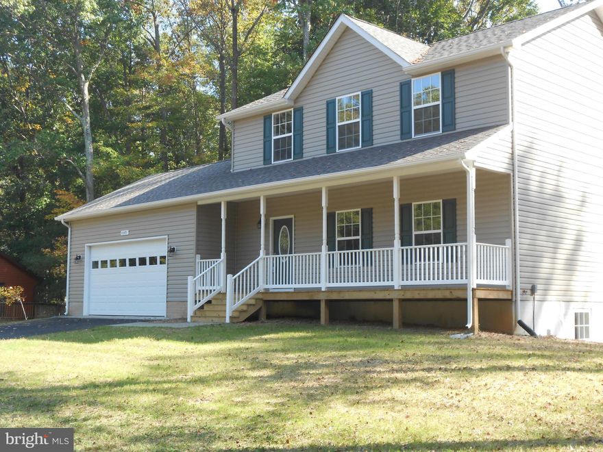 Brand new and ready to be moved into. 2700 sq. feet of finished space. Separate living room, family room,exercise room and or office.  Lots of space.  Full finished walkout basement.  2 car garage with paved driveway.Stainless steel appliances, walk in closets and title floor in kitchen, dining room and baths. All on 2.82 acres.  Nice.