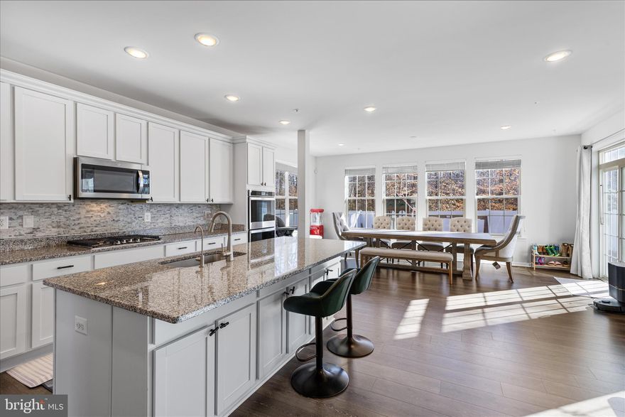 Set within the sought after Signature Club community of Accokeek, this beautifully maintained home delivers the space, layout, and modern features today’s buyers are looking for. This Caruso Homes Michigan floor plan features over 4,000 square feet of finished living space across three levels, designed for both everyday living and entertaining. The main level is bright and open with 9 foot ceilings and a layout that flows effortlessly from room to room. At the heart of the home is a gourmet kitchen complete with granite countertops, tiled backsplash, stainless steel appliances, double wall ovens, cooktop, island sink, and abundant cabinet and counter space. A butlers pantry and additional pantry provide excellent storage, while the breakfast area bump out creates the perfect space for casual dining. The kitchen opens directly to the family room, creating a comfortable gathering space, while formal living and dining rooms offer flexibility for entertaining or work from home needs. Just off the two car garage entry is a convenient mudroom. The upper level continues the spacious feel with four generously sized bedrooms and two full baths, including a well appointed primary suite with two walk in closets and an en suite bath. A full hall bath and second floor laundry add everyday convenience. The finished basement expands your living options with a large recreation room, bathroom rough in, and additional space ideal for a future bedroom, office, gym, or flex area, along with extra storage. Outside, enjoy a level fenced backyard and patio, perfect for entertaining, grilling, or relaxing evenings. Conveniently located near Accokeek Neighborhood Park, Piscataway Park, and the National Colonial Farm along the Potomac River, with easy access to shopping, dining, and entertainment in Waldorf, Brandywine, and National Harbor. Commuters will appreciate access to Route 210, Route 301, and the Capital Beltway, providing a direct route to Washington DC, Joint Base Andrews, Joint Base Anacostia Bolling, the Pentagon, and surrounding employment centers. Schedule your tour today and experience everything this home has to offer.