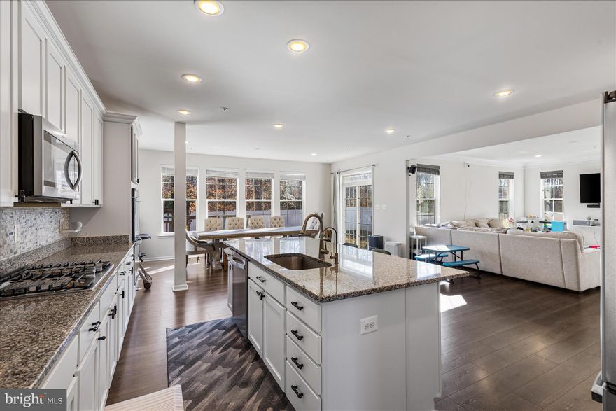 Evening showings are available Tuesday and Thursday. Welcome to this beautifully maintained 2021 Caruso Michigan floor plan located in the desirable Signature Club community of Accokeek. Combining modern style with impressive space, this home offers over 4,000 square feet of finished living space across three levels, providing plenty of room for everyday living, entertaining, and flexible use. The exterior welcomes you with a classic brick water table and a two car garage. Inside, 9 foot ceilings on the main level create a bright and open feel throughout the home. The gourmet kitchen is designed to be the heart of the home and features granite countertops, tiled backsplash, stainless steel appliances, double wall ovens, cooktop, island sink, and abundant cabinet and counter space. A butlers pantry and additional pantry offer excellent storage, while the breakfast area bump out provides extra space for casual dining. The kitchen opens seamlessly to the family room, creating a comfortable open concept gathering space, while the formal living and dining rooms offer additional flexibility for entertaining, working from home, or creating separate sitting areas. Just off the garage entry is a convenient mudroom. The upper level continues the spacious layout with four generously sized bedrooms and two full bathrooms, including a large primary suite with two walk in closets and an en suite bath. A full hall bath and second floor laundry provide added convenience. The finished basement extends the living space even further with a large recreation room ideal for entertaining, movie nights, or game space, along with a bathroom rough in and additional area that could easily become another bedroom, office, gym, or flex room depending on your needs, plus extra storage. Outside, enjoy a level fenced backyard and patio offering plenty of space for outdoor gatherings, grilling, or relaxing evenings around a fire pit. Conveniently located near Accokeek Neighborhood Park, Piscataway Park, and the National Colonial Farm along the Potomac River, the home also offers easy access to shopping, dining, and entertainment in Waldorf, Brandywine, and National Harbor. Commuters will appreciate convenient access to Route 210, Route 301, and the Capital Beltway for travel to Washington DC, Joint Base Andrews, Joint Base Anacostia Bolling, the Pentagon, and other major employment centers. Highest and best offers due by March 15th at 6:00 PM.