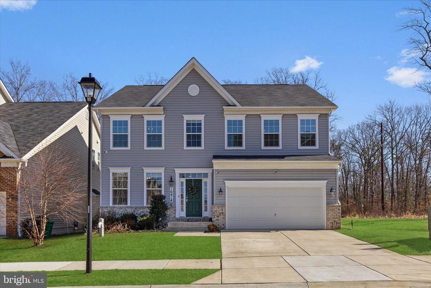 Highest and best offers due by March 15th at 6:00 PM. Welcome to this beautifully maintained 2021 Caruso Michigan floor plan located in the desirable Signature Club community of Accokeek. Offering modern design, generous living space, and move-in ready convenience, this home provides the benefits of newer construction without the wait. A charming exterior with a brick water table and two car garage welcomes you home. Inside, 9 foot ceilings on the main level enhance the open and spacious layout. The gourmet kitchen is designed for both everyday living and entertaining and features granite countertops, tiled backsplash, stainless steel appliances, double wall ovens, cooktop, island sink, and abundant cabinet and counter space. A butlers pantry and additional pantry provide excellent storage, while the eat in breakfast area bump out offers plenty of room for casual dining. The kitchen flows into the family room creating a comfortable open concept gathering space, while the formal living room and separate dining room provide additional flexibility for entertaining or everyday living. Just off the garage entry is a convenient mudroom. The upper level features four bedrooms and two full bathrooms including a spacious primary suite with two walk in closets and an en suite bath. The second level also includes a full hall bath and a conveniently located laundry room. The fully finished basement provides a large recreation room ideal for entertaining, relaxing, or game nights, along with a bathroom rough in and additional space that could easily become another bedroom, office, or flex space depending on your needs, plus additional storage. Outside enjoy a level fenced backyard and patio offering plenty of room for outdoor gatherings, grilling, or evenings around a fire pit. Located near Accokeek Neighborhood Park, Piscataway Park, and the National Colonial Farm along the Potomac River, this home also offers convenient access to shopping, dining, and entertainment in Waldorf, Brandywine, and National Harbor. Commuters will appreciate proximity to Route 210, Route 301, and the Capital Beltway providing access to Washington DC, Joint Base Andrews, Joint Base Anacostia Bolling, the Pentagon, and other major employment centers.