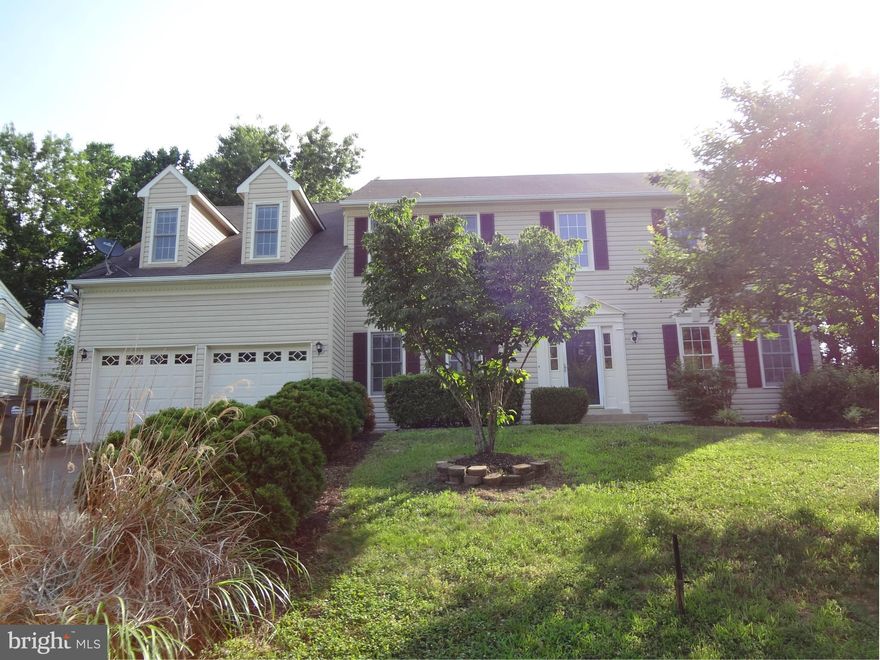 Great Large Home! Huge Master Suite! Gourmet Kitchen w/Granite Counters, Stainless Appliances, New Cooktop, Built-In Drink Cooler & Over-Sized Eating Area; Hardwood Floors in Two Story Foyer & Kitchen; New Carpet on the Main Living Level & Basement; Large Master BR w/Separate Sitting Area & Closets Galore; Fresh Interior Paint...too much to list!  Home is a Must See!