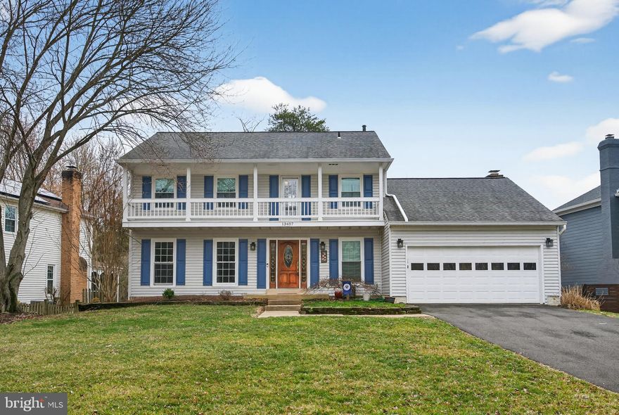 Located in the sought-after Poplar Tree community and just moments from Fair Lakes and Greenbriar Shopping Center, this beautifully maintained 4-bedroom, 2.5-bath colonial offers the perfect blend of classic charm and everyday functionality. From the moment you step inside, hardwood floors guide you through the living, dining, and family rooms, where such touches as crown molding and an updated light fixture add timeless elegance. The spacious living room provides a welcoming space to gather, while the dining room is ready for holiday dinners and celebrations. At the heart of the home, the kitchen features ceramic tile flooring, a peninsula for extra prep space, a moveable island for flexibility, and a sunny eat-in breakfast area framed by a bay window—an ideal spot for morning coffee. The adjacent family room soars with a vaulted ceiling and centers around a brick wood-burning fireplace, with direct access to a screened-in porch that invites you to relax with a ceiling fan overhead on warm evenings. Upstairs, the primary suite offers plush carpeting, a walk-in closet, and a beautifully updated bath with a frameless glass shower and bonus vanity area. Three additional bedrooms with ceiling fans and double-door closets share a roomy and updated hall bath. The walk-out lower level expands your living space with engineered hardwood floors and built-ins in the large recreation room. Also enjoy a dedicated craft or office space with doors for privacy, a workout/workshop/multi-purpose room, and generous storage. Outside, take advantage of the deck with room for grilling, a concrete patio, and a flat, fenced backyard perfect for play or gardening. Community amenities include a swimming pool, tennis courts, playgrounds, picnic areas, and walking paths—creating a lifestyle that balances convenience, comfort, and connection. Welcome home!