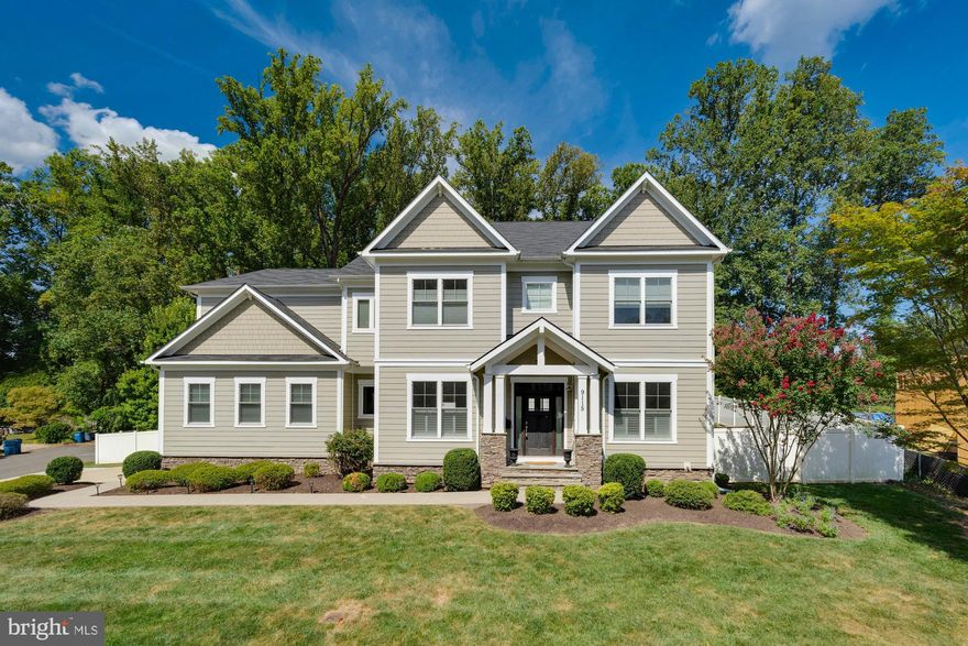 Stunning custom Craftsman home sited on a quiet cul-de-sac and premium .42 acre corner lot. This home features 5 bedrooms, 4.5 baths and 5,058 square feet over 3 levels. Oversized 3 car side-load garage with storage. Entertain in style with a welcoming foyer, formal dining room. Gourmet kitchen with quartz counter tops, tile backsplash, large island, pendant lighting, top of the line appliances, walk-in pantry, butler’s pantry with wine storage and a wine refrigerator. Adjoining breakfast room with French door access to deck. Open family room with coffered ceiling and fireplace. A home office, mudroom with custom cubbies and a half bath are also found on the main level. Luxurious owner’s suite features a custom walk-in closet with island, and en suite bathroom with  soaking tub, frameless glass rain shower. Three additional bedrooms all with en suite access to a full bath. Finished walk-up basement with a recreation room, exercise room, 5th bedroom and full bath. Outdoor entertaining on the back deck, patio, and fenced yard that backs to trees. Amazing Vienna location convenient to Metro, commuter routes, downtown Vienna shops, restaurants, parks, trails and more. Top rated Marshall Road/Thoreau/Madison pyramid. Back on market due to Financing.