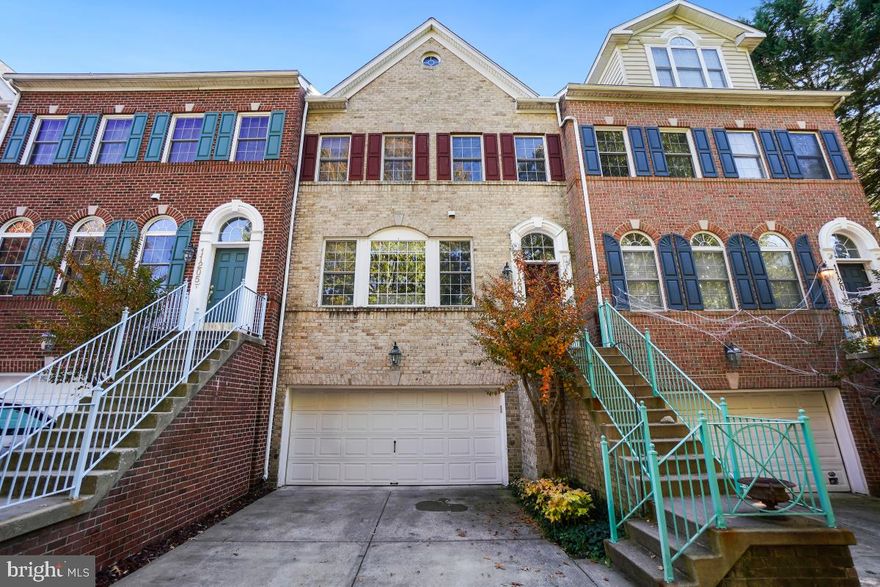 A truly lucky find in one of the most desired and rarely available communities around North Bethesda. This brick front three-level town home includes plenty of features for comfortable living and desirable nearby accessibility. Beginning on arrival is the driveway and two car garage with access to the lower level and staircase to the main level. Once inside, you are greeted with 8+ foot ceilings with open main living area with a half bathroom before reaching the dining area. Next, you'll enter the vast open kitchen space with 10+ foot ceilings and tons of natural light, featuring a five-burner gas stove and wonderful granite countertops with a nicely complementary backsplash and generous cabinet space leading to the eating area. Also included are recessed lighting and wood floors throughout the main level along with a ceiling fan and fireplace. To make this area even better for entertaining is the massive deck space that is large enough for a single-family home accessible through the door from the kitchen. The basement is fully finished with a lounge area and bedroom along with a full bathroom and sliding doors to fenced in outdoor space and also access to garage in the front. Going upstairs to the third level, you'll see matching carpet throughout, leading to the guest bedroom before reaching the full bathroom in the hallway and then finally upstairs to the primary bedroom suite which includes a massive walk-in closet and full bathroom with separate vanity and tile floors. Take a step back outside the home and you'll notice the rest of the well maintained and fenced neighborhood which is across the street from the entrance to the Bethesda Trolley Trail while also around the corner from Whole Foods, coffee shops, shopping, restaurants and more. Pike & Rose and North Bethesda Metro are both less than one mile away and key access points like Rockville Pike, I-270, & 495 are easily accessible.  Comfort and style truly meet accessibility and convenience. Come take a look at it yourself to see what makes this such a valuable opportunity.  LOCATION, LOCATION, LOCATION!!!