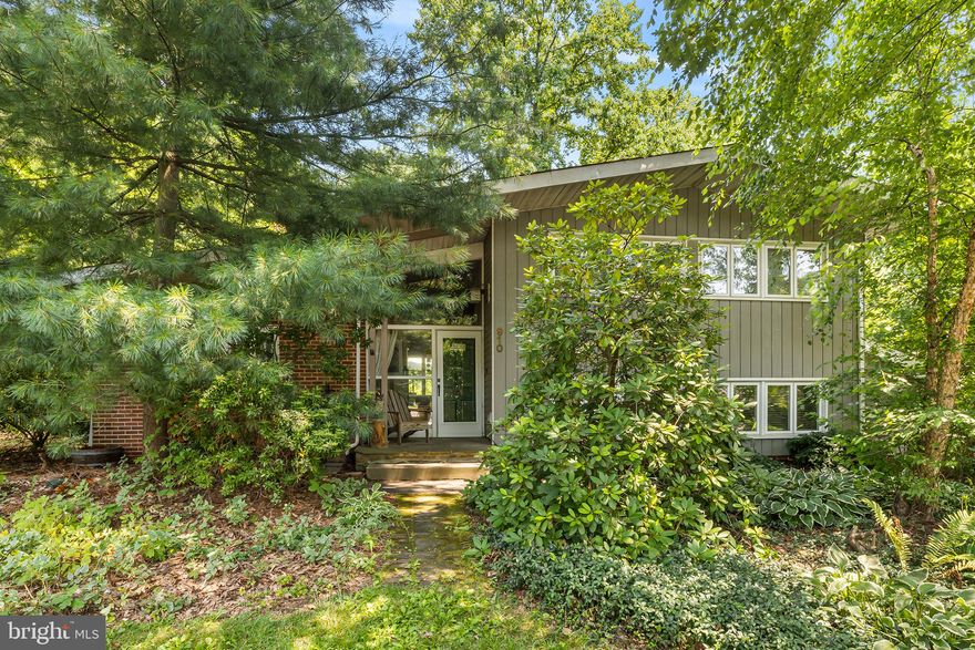 Welcome to this inviting home nestled among mature trees and perennials in this highly desirable neighborhood in Springfield Township. From the moment you step inside, you'll be captivated by the artistic touches that make this house truly unique.
The white-washed cedar cathedral ceilings exude warmth and character, while the wood-burning stove serves as the heart of the home, providing both comfort and a cozy ambiance during colder months. The large wall of windows allows you to immerse yourself in the beauty of the changing seasons, bringing the outdoors in and creating a seamless connection with nature.
The main floor features a retro-styled kitchen and a spacious dining area, perfect for entertaining family and friends. Upstairs, the California-style split-level design offers three bedrooms and two full baths, providing ample space for relaxation and privacy.
On the lower level, a cozy family room with built-ins awaits, along with a convenient powder room. The highlight of the lower level is a dedicated office/studio with a separate entrance, custom-built for people to work from home. With plenty of cabinets, workstations, and additional storage in a crawl space, this office is a haven for productivity and creativity.
This home is designed for indoor/outdoor living, with easy access to the backyard through a glass door leading to a spacious deck and a charming patio. Another slider from the lower level opens up to yet another inviting patio. The backyard boasts mature trees, including a Flowering White Dogwood and a Peachtree, along with a Venessa Red Grapevine and a Gala Apple tree. A surprise awaits towards the back of the yard—a serene meditation pond. Its gentle sounds of flowing water and a peaceful atmosphere provide an ideal quiet reflection and mindfulness space. Completing the property is a shed and a compost area, offering practicality and convenience. There is extra outdoor storage in the attached garden shed off the deck and a spacious shed at the end of the driveway.
This home is ideally located within walking distance of the highly regarded Springfield Township Schools, fields, and the Springfield Township Library. Just one mile away, Cisco Park and Hillcrest Pond offer additional opportunities for outdoor recreation. The location is unbeatable, with easy access to Route 309, PA Tpk, Flourtown shopping, the Morris Arboretum, Wissahickon Valley Park, Fort Washington State Park, and the historic charm of Chestnut Hill.
Don't miss the chance to make this well-loved property your own. Schedule a showing today and embrace the beauty, comfort, and convenience that await you at this one-of-a-kind home in Springfield Township.