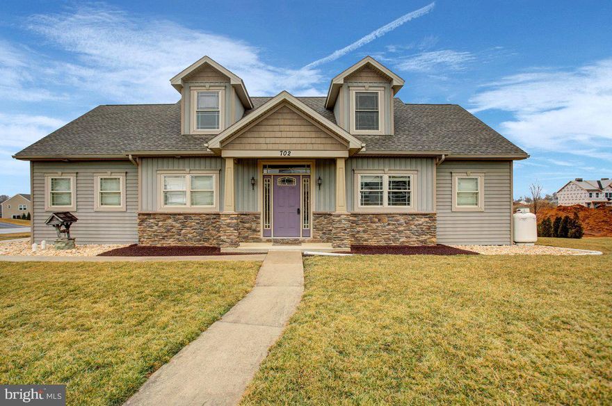 Located in the highly convenient Southwood Crossing neighborhood, this truly one-of-a-kind home is a custom creation by Rine & Rine Builders, thoughtfully designed with comfort, longevity, and flexibility in mind—making it ideal for multi-generational living. Offering 4 bedrooms and 3 full bathrooms, the home features open-concept living, main-level laundry, and wide 36-inch hallways throughout for ease of living.

The primary bedroom is located on the first floor and includes a private en-suite bath with dual sinks, a jetted tub, and a spacious walk-in closet—perfect for those seeking main-level living. Just off the garage, a third full bathroom provides a convenient space for cleaning up after outdoor projects or hosting gatherings. Upstairs, a second primary suite offers excellent separation and privacy, complete with its own private bath and a convenient laundry chute.

Soaring 9-foot ceilings enhance the home’s open feel, while the cathedral ceiling in the main living area makes a stunning impression. A gas fireplace anchors the space, creating a warm and inviting atmosphere. Built for busy households, the home includes two water heaters, along with four brand-new mini-splits for efficient heating and cooling, plus two additional units with recently replaced lines and coils.

The lower level adds opportunity to expand with a propane fireplace, poured concrete walls, Bilco doors for exterior access, and a convenient plumbing manifold. Best of all, the lot directly behind the home is designated as a neighborhood rain garden—offering added privacy with no neighbors behind.

This home is truly unlike any other in the neighborhood—custom built, exceptionally maintained, and perfectly suited for those seeking space, privacy, and long-term living solutions under one roof.