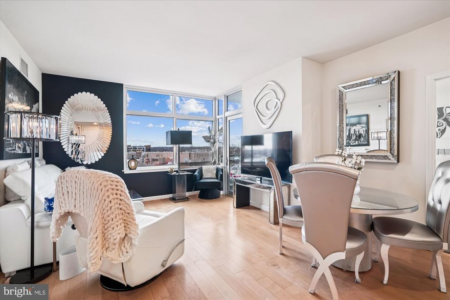 Located on the 6th floor of Midtown Bethesda North, this beautiful 2-bedroom, 2-bath condo plus den and private balcony offers more than 1,400 square feet of bright, open living space. The home has been freshly painted throughout and features brand-new hardwood floors, creating a clean, move-in-ready feel.

The open floor plan with 10-foot ceilings and expansive windows fills the space with natural light and beautiful views.  The versatile den is perfect for a home office or additional living space, while the private balcony provides relaxing outdoor space.

Additional features include stainless steel appliances and  granite countertops, custom closets, built-in storage,  a full-size washer and dryer, 2 garage parking spots, and several fobs.  Water and gas are included in the condo fee.

Midtown Bethesda North offers resort-style amenities including a rooftop pool, fitness center, theater room, party lounge, guest suite, and 24-hour concierge. Conveniently located near North Bethesda and Twinbrook Metro, Montrose Crossing, Pike & Rose, and numerous dining, shopping, and grocery options.

Home is now vacant and all furniture has been removed.  The home has been freshly  painted and the  New Wood Floors will absolutely impress you.  Custom cabinet piece is on order...it will look just as the picture does!