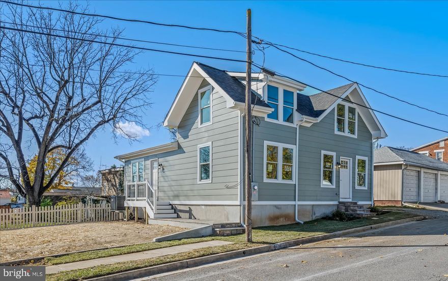 Welcome home to 511 Berry St. in Martinsburg, WV! This beautifully renovated 1919 colonial blends timeless charm with the comfort and convenience of modern living.

A thoughtfully designed main-level bedroom and full bath, along with a brand-new kitchen, anchor the home’s recent addition. The flexible floorplan offers options for a home office, formal living room, or a combined living/dining space—whatever best fits your lifestyle.

Enjoy ceiling fans in all main-level rooms, new carpet and LVP flooring, and recessed lighting throughout. The spacious eat-in kitchen overlooks the backyard and provides a clear view of the Martinsburg High School football field.

No detail has been overlooked—all plumbing, electrical, and mechanical systems have been completely replaced, giving you peace of mind for years to come.

Located on a corner lot within walking distance of Martinsburg High School and just minutes from Route 9 East and I-81, this home is ideal for commuters. There’s plenty of on-street parking for guests, and the yard offers ample space to fence for pets or play.

Upstairs, you’ll find three generously sized bedrooms and a full bath. The cellar-style basement houses mechanicals and provides additional storage.

Don’t miss your opportunity to tour this beautifully updated home—you’ll be amazed by all it offers!