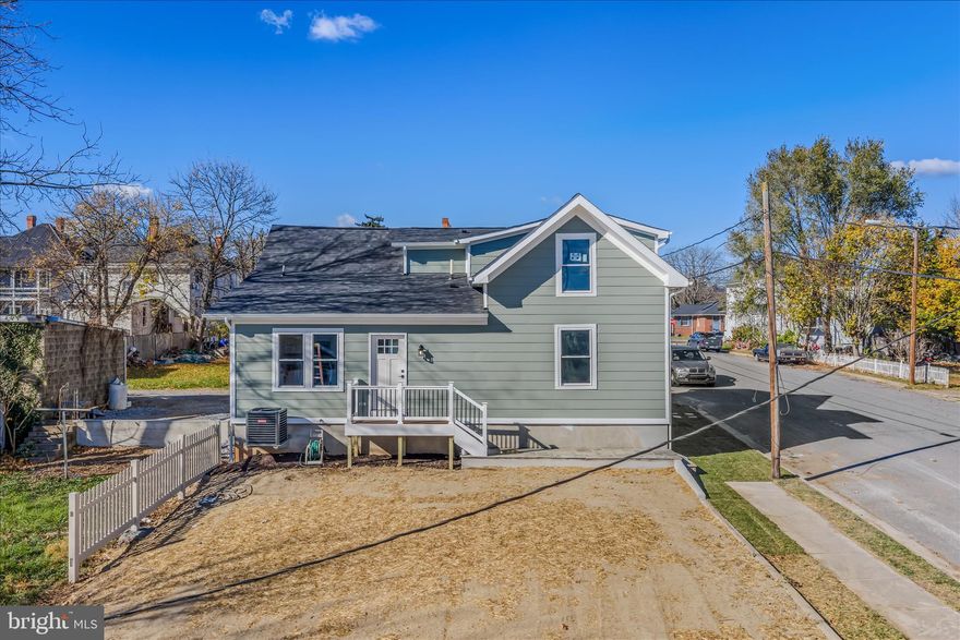 Welcome home to 511 Berry St. in Martinsburg, WV! This beautifully renovated 1919 colonial blends timeless charm with the comfort and convenience of modern living.

A thoughtfully designed main-level bedroom and full bath, along with a brand-new kitchen, anchor the home’s recent addition. The flexible floorplan offers options for a home office, formal living room, or a combined living/dining space—whatever best fits your lifestyle.

Enjoy ceiling fans in all main-level rooms, new carpet and LVP flooring, and recessed lighting throughout. The spacious eat-in kitchen overlooks the backyard and provides a clear view of the Martinsburg High School football field.

No detail has been overlooked—all plumbing, electrical, and mechanical systems have been completely replaced, giving you peace of mind for years to come.

Located on a corner lot within walking distance of Martinsburg High School and just minutes from Route 9 East and I-81, this home is ideal for commuters. There’s plenty of on-street parking for guests, and the yard offers ample space to fence for pets or play.

Upstairs, you’ll find three generously sized bedrooms and a full bath. The cellar-style basement houses mechanicals and provides additional storage.

Don’t miss your opportunity to tour this beautifully updated home—you’ll be amazed by all it offers!