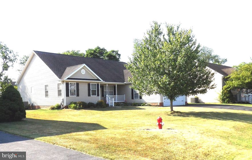 When looking at a home they say location is everything. This larger 3 bedroom, 2 full bath rancher is both charming and is located in the much sought after Laurel Ridge subdivision Conveniently located  just off Rt. 9, just west of I81 at exit 16. Convenient to WV, MD, and VA, Not to far out and not to close in. Over 1900 above grade square feet  with a full unfinished basement. That means all the rooms are larger than your average 3 bedroom rancher. Enough room for the whole family and more. Oversized Primary Suite with ensuite bath , walk in closet, tray ceiling and more. The Kitchen features space for a table, Granite countertops, plenty of cabinet space, a pantry and much more. An oversized two car garage is big enough for two pickup trucks and your bike. Large rooms throughout this home, stretch out and relax. A Large 16 X 12 Deck with vinyl railings.  Well maintained and very clean. Fresh paint and many flooring upgrades make this home a must see.  Call me today to schedule your personal showing .
