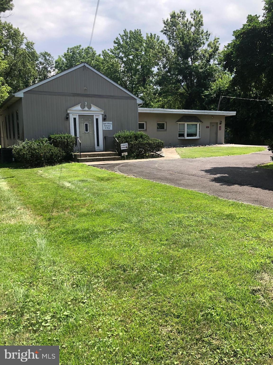 Great opportunity for any professional use or for a commercial use allowed under the zoning. Turnkey property that is in excellent move in condition and can come furnished if buyer so desires at no additional cost. Currently used as a law and psychology office. High traffic location just off traffic light to Parx Casino and very close to Street Road where you are no more than a mile from Route 1, PA turnpike, or I-95. Just under one acre of ground with large paved parking and separate outside storage facility. Approximately 2400 sf. building completely renovated consists of reception area, five spacious private offices, conference room, bathroom, kitchen and separate file room. Central air conditioning. Low taxes and utilities. Street signage with excellent visibility. This is excellent for an aggressive group of professionals who just want to bring their paperwork and computers and immediately start operating without having to worry about furnishing the facility. Occupancy can be given after Labor Day.