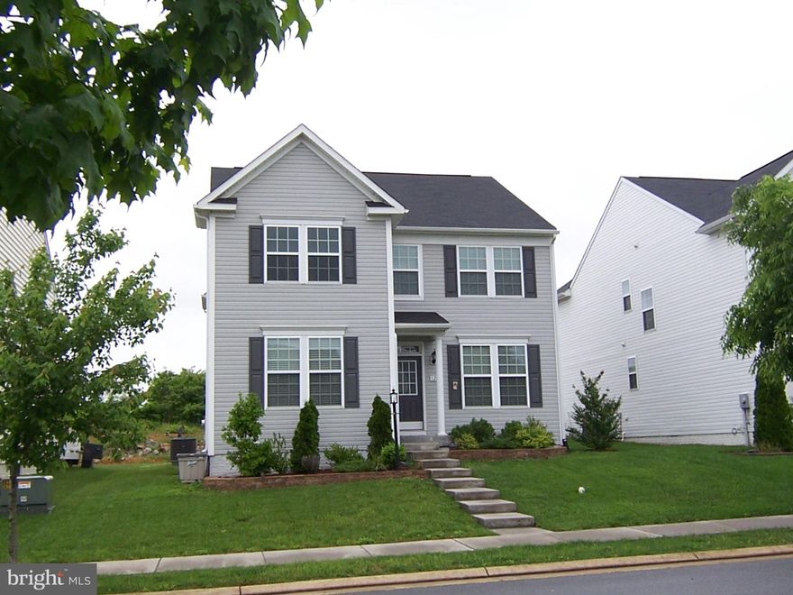 FEELS LIKE HOME !!! There is nothing to do but move into this Pristine Colonial   - Offers New Carpet & Hardwood floors , Spacious Bedrooms, Large Master Suite with walk-in closet master bath with Dual Vanities, Soaking Tub & Separate Shower, Open Floor Plan on Main Level with 2 story  Living room, Dining Room and Kitchen with Breakfast Area or Sitting Area - your choice !! Basement fully finished with additional Bedroom & Full Bath. Private rear yard with 10 x 12 maintenance free deck & rear loading Garage. Well- Maintained Located in Fairfax Crossings less than 2 minutes to Shopping, Rt 9 Bypass, Hospital. EASY TO SHOW!!