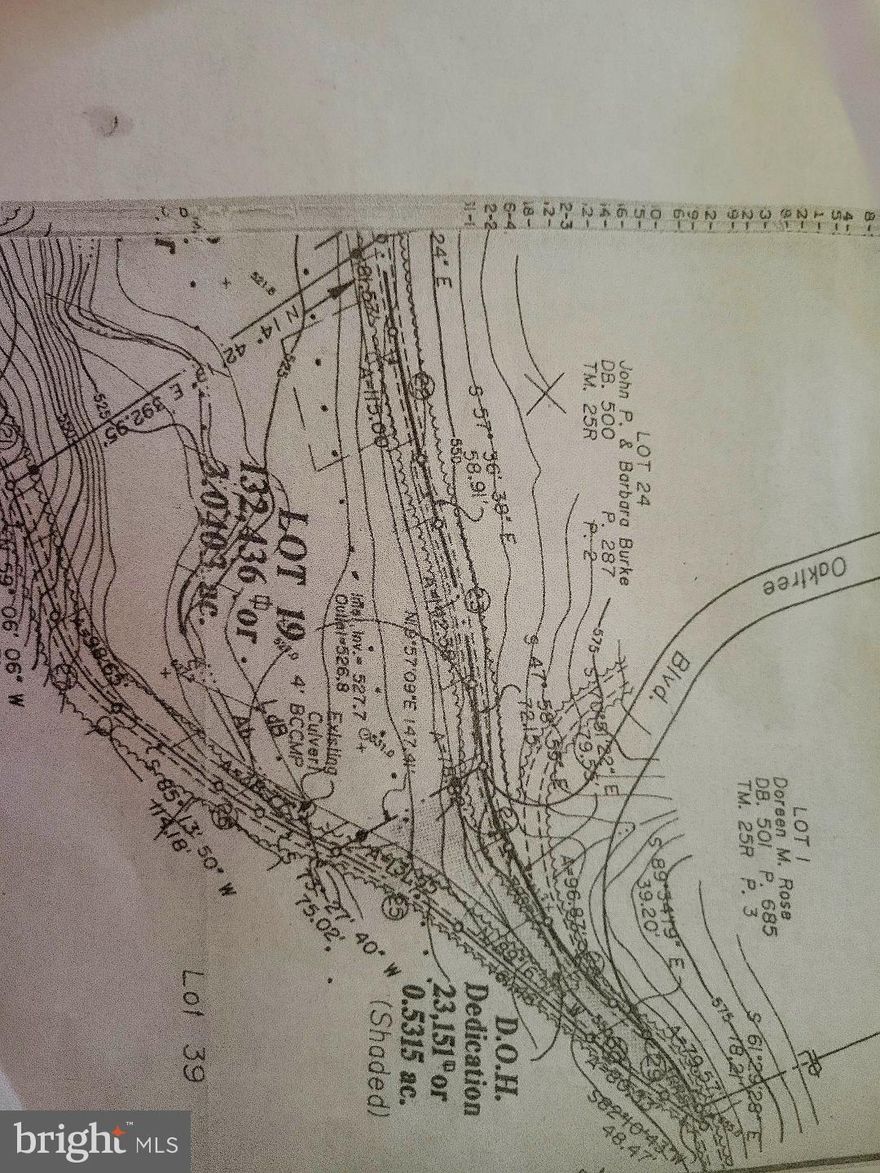 If you are looking for a home site with a beautiful stream on it, here it is.  The owner says it is a spring fed stream and it is  beautiful.  Mature trees and state road access on the front of the parcel and back.  This would be a spectacular home site