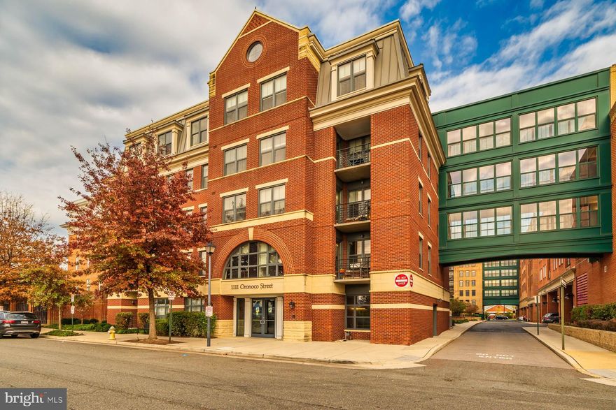 Stunning 1BR/1BA condo at The Henry in Old Town Alexandria. This condo features an open concept kitchen with stainless steel appliances, granite countertops and hardwood floors throughout.  Enjoy a large living room with a balcony, perfect for enjoying those quiet nights.  The sizable master bedroom includes a huge walk-in closet.  Price includes 1 assigned underground parking space and 1 underground storage unit. Condo fee includes, fitness center, party room, elevator, secure building and concierge service. Walk to Braddock Rd. Metro and Reagan National Airport is less than 10 minutes away.
