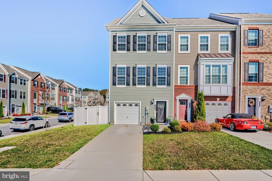 Welcome Home & step into modern elegance with this 2020-built end-unit townhouse located in the esteemed Beechtree community. Featuring three levels of luxurious living space, this home is designed to impress with its array of high-end finishes and thoughtful layout. Upon entry, the wide plank luxury vinyl plank wood floors set a stylish tone that flows throughout the home. The welcoming foyer leads to a cozy recreation room, upgraded with plush carpeting and recessed lighting, perfect for relaxation or entertaining. Sliding glass doors open to a serene, fully fenced backyard, boasting a sleek vinyl privacy fence for your ultimate seclusion. Ascend to the heart of the home featuring an expansive eat-in kitchen, where culinary dreams come true. Equipped with a gas cooktop, double oven, granite countertops & upgraded white cabinetry, this kitchen is a chef’s paradise. The large island and breakfast bar offer ample seating and preparation spaces,  the eating area is large enough to host a formal dinner & is complemented by sliding glass doors that provide the option for future deck expansion. The kitchen seamlessly transitions into the spacious living room, highlighted by 9-foot ceilings, stylish ceiling fan & additional recessed lighting, making it an ideal space for gatherings. Retreat to the private quarters where the primary bedroom awaits with a walk-in closet & an en-suite bath featuring a double vanity with granite tops and a luxurious walk-in shower. Two additional spacious bedrooms, a second full bath & a convenient upper-level laundry area complete this floor. Live a resort-like lifestyle with access to a community clubhouse, pool, fitness center, walking trails & tennis courts. 1230 Gaston Road represents the pinnacle of townhouse living with its premium kitchen and flooring upgrades—the finest in the community. Embrace this opportunity to own a meticulously designed home in a vibrant community, where luxury meets convenience and style.