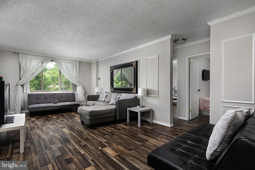 RARE 1st Floor CORNER UNIT move in ready Condo contains 2BR/1BA & LOTS OF NATURAL SUNLIGHT that brightens all rooms. Located in highly sought-after North Arlington across from Lyon Village Shopping Center contains Giants Grocery Store, Italian Store, Starbucks & More. Spacious condo with UPDATED SPA LIKE SHOWER. Kitchen with Gas cooking & Stainless Steel appliances. Living Room areas has Original Built-in Bookcase, Dining room area, Plenty of storage space with Linen Closet, Hall Coat Closet/ Storage, Bedroom Closet Organizers and Extra Space used as Office,& large storage Bin located within building. Each room has its own Thermostat  for heating and cooling. Laundry located 1st floor &  on every level of condo with easy access by elevator. Pool & grill area on 4th floor. Bike room on 2nd floor. Clarendon Metro1.8 walking distance to Claredon which host lots of food and entertainment. Spout Run is short drive to D.C one Exit away from Key Bridge.  CARDINAL HOUSE Condominium comes with many amenities including Laundry every floor, Outdoor Pool & Picnic area, fully equipped Fitness Center, Billiard room, Party room, PLENTY OF Parking, On-Site Management & Secure Bike Storage + LARGE Assigned bin storage. Cardinal House is in an ideal commuter location, w/ Custis TRAIL across from building for biking, walking to D.C. or Falls Church. Playground across the street by Lee Highway. Condo fees include all utilities except cable and internet & Decal parking conveys with this property & plenty of visitors parking for guest. VA and FHA approved. NOTE: Cats OK, but No dogs permitted.