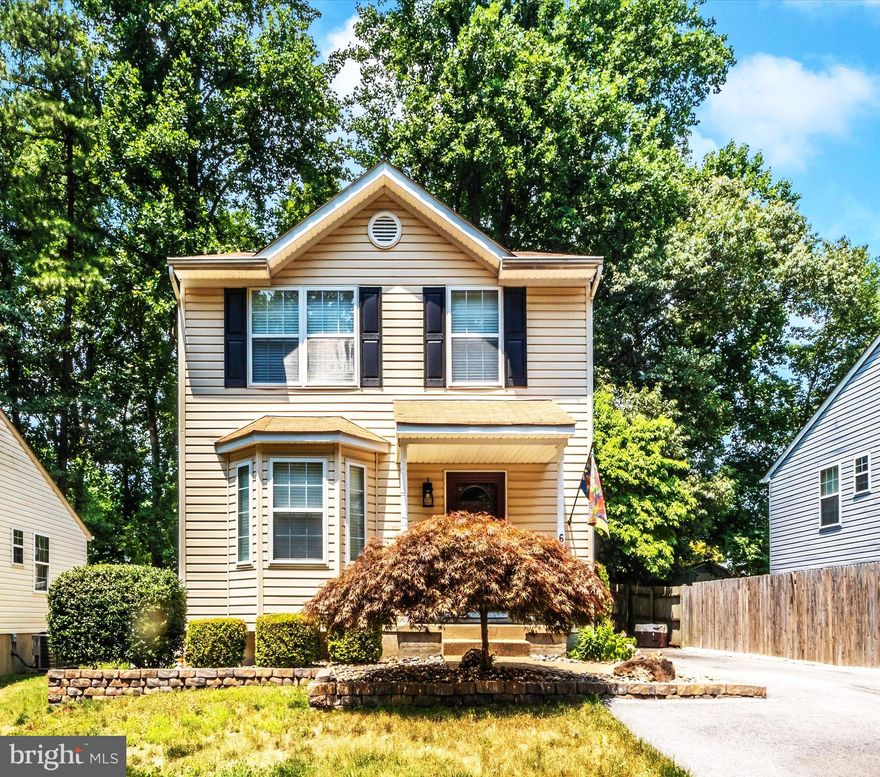 Located in the desirable Green Haven neighborhood of Pasadena, and close to schools, shopping centers, and parks, this charming move-in-ready 3-bedroom house sits on a double lot on a dead-end street, facing trees. The property boasts excellent curb appeal, with well-maintained landscaping and an inviting front entrance. Inside, you'll find neutral decor throughout, creating a warm and welcoming atmosphere.
The main floor features a spacious living area with a cozy gas fireplace, perfect for relaxing evenings. The open kitchen and dining area provide seamless access to a large deck and a beautiful backyard, ideal for entertaining. The private yard includes a fire pit area and mature trees providing filtered sunlight, with enough space to add a detached garage or an ADU.
The finished basement, which also has an outside entrance, includes a laundry room, storage area, powder room, large rec room, and a wet bar. The upper level boasts three bedrooms and two full bathrooms, with additional storage available in the attic with added flooring. Outside, the property offers ample parking with an extra-wide driveway that extends to the back of the house. The driveway is large enough for six cars, or a boat or an RV. Why pay to store your boat or RV when you can park at your home? The current owners have made significant improvements, including Brazilian cherry hardwood floors and new carpet, ensuring this home is ready for its next owners.