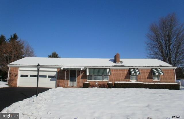 Very well maintained solid brick rancher on nice level lot in West York School District. Gorgeous hardwood floors in every room except kitchen & bath. Replacement windows. Heated 2 car garage, 16'x10' covered patio and more. Full basement with fireplace - ready to be finished. 1 yr AHS Home Warranty.