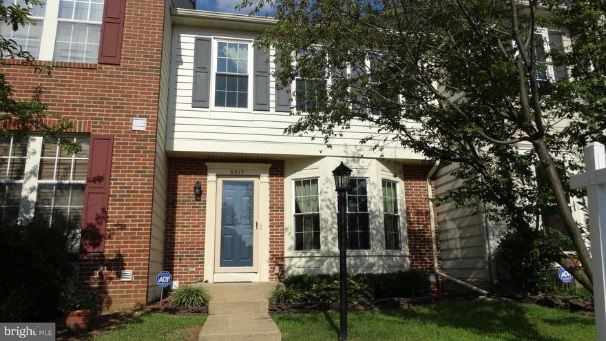 Kingstowne TH with recent updates include windows, doors, insulated siding, gutters, gas range, SS Hood, top grade dishwasher, HVAC, carpet and more! Freshly painted throughout! Incredible lot with deck and patio backing to trees. Lower level Rec. room with gas fireplace and walkout to patio. Lower level home office/den with built-in bookcases and storage.  Tons of parking for your guests too!