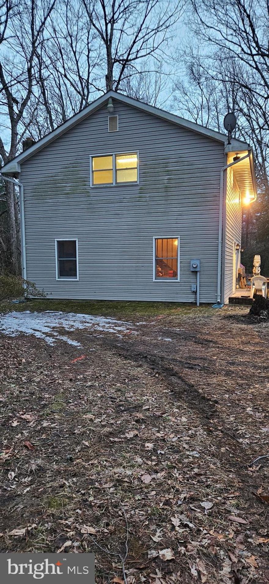 This unique property features a 5.33 acre parcel and a barn dominium.   Experience some peace and tranquility on this beautiful piece of property.  There is a stream below, but doesn't affect the living area.  The barn dominium is being sold "As Is"  needs updating. The septic failed inspection.  Seller is having a new site evaluation done this month.