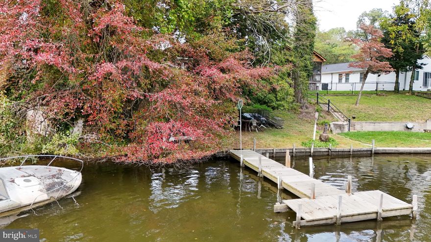 Discover the potential of this prime waterfront property nestled in a quiet, well-established neighborhood. This home is being sold as a tear-down, offering a rare chance to start fresh and create your ideal home from the ground up.
This 1/3 acre lot provides ample space for designing your dream residence. Conveniently situated near schools, parks, shopping, and dining, you’ll enjoy the perfect balance of peaceful living  and accessibility.
This property is being offered as-is, with the value lying in the land and the exceptional opportunity it presents.
This is your chance to tear down and build new in a sought-after location. Don’t miss the opportunity to transform this property into something truly extraordinary. Schedule a viewing today and imagine the endless possibilities!