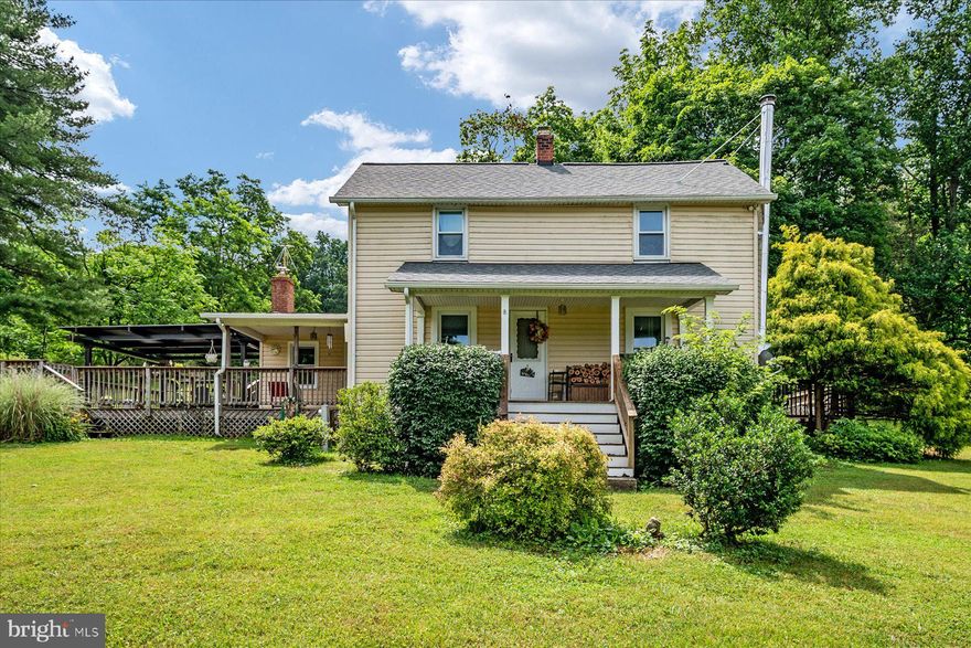 Welcome Home! This spacious three bedroom farm house is tucked away on TEN ACRES in the heart of Darlington. The oversize garage houses stables and a workshop with a large sliding entrance and access to the road. Fully renovated kitchen with plenty of counter space, new paint and flooring in the living and dining rooms. Enjoy summer evenings on your oversized deck with retractable awning and picnic tables. Ample parking in the horseshoe driveway and covered outdoor space on the front and side porches offer the perfect layout for entertaining! The property also features a dog run, chicken coops, and several out buildings for storage of all kinds. Country living just minutes from local shopping and commuter highways. Won't last long.. schedule a showing today!