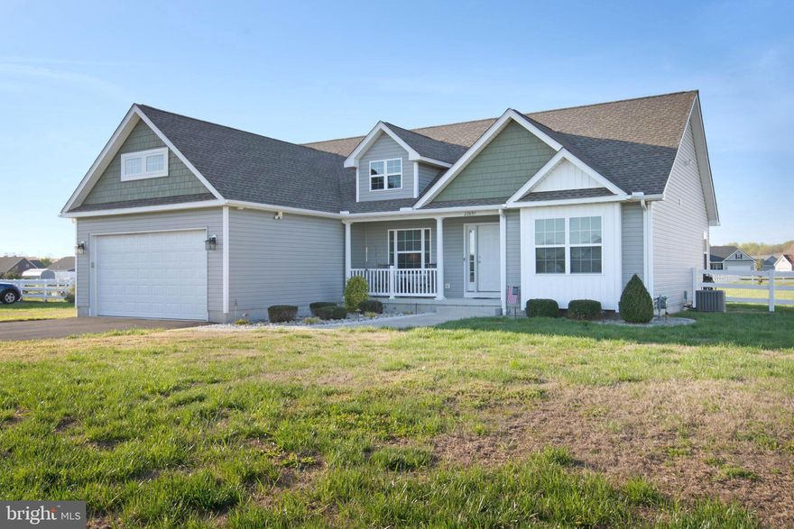 Nestled in the charming Village of Jefferson Crossroad, this delightful ranch-style home offers a perfect blend of comfort and modern living. Built in 2018, the residence features an inviting open floor plan that seamlessly connects the living, dining, and kitchen areas, ideal for both relaxation and entertaining. The spacious kitchen boasts upgraded countertops and stainless steel appliances, including a self-cleaning oven and built-in microwave, making meal prep a joy. With three cozy bedrooms and two well-appointed bathrooms, including a primary suite with a luxurious bath, this home is designed for convenience and comfort. Enjoy the warmth of the gas fireplace on chilly evenings, while recessed lighting adds a touch of elegance throughout. Step outside to discover a beautifully landscaped 0.75-acre lot, offering ample space for outdoor activities. The level yard is perfect for gatherings, and the patio provides a serene spot for morning coffee or evening relaxation. Additional features include a shed for extra storage and a two-car attached garage with a paved driveway. Energy-efficient windows and a tankless water heater enhance the home's sustainability, while security features ensure peace of mind. Located in a community that includes common area maintenance and snow removal, this property is not just a house; it's a place to call home. Experience the perfect blend of modern amenities and serene living in this inviting residence.